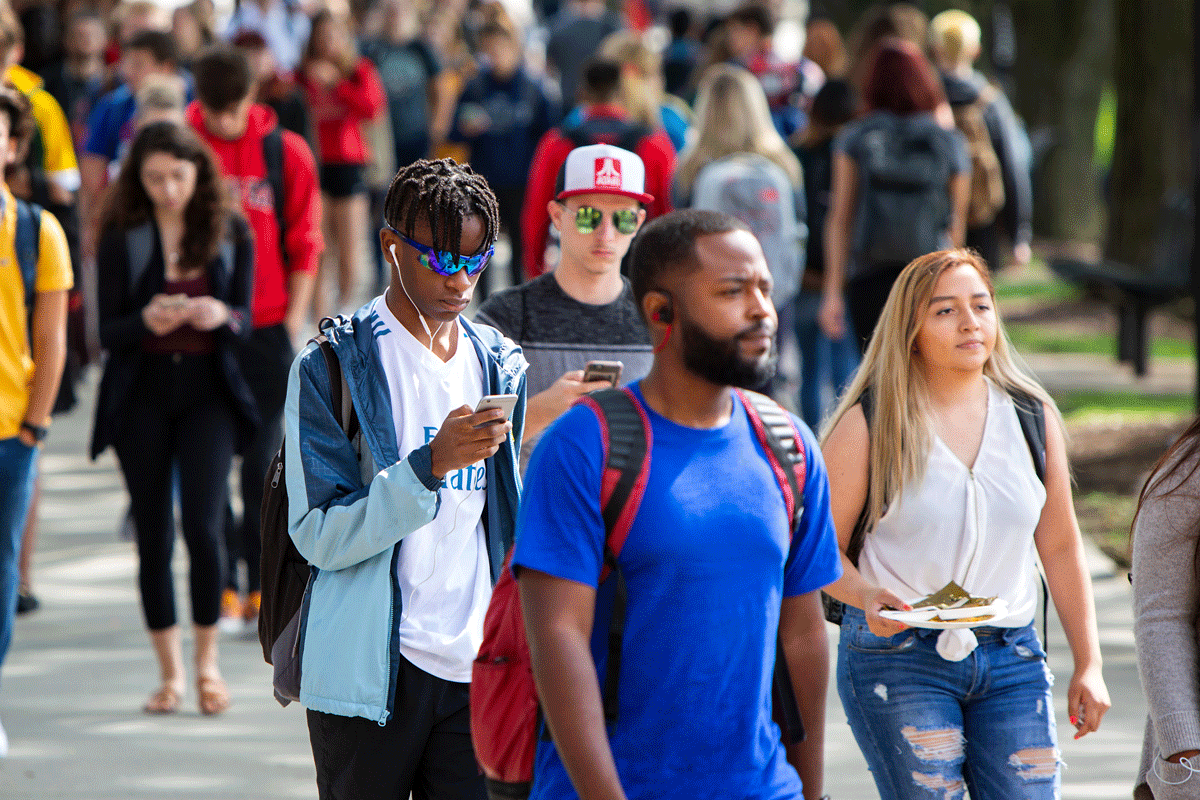 students walking on campus