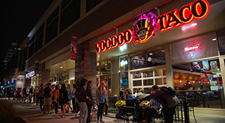a picture of the front of the restaurant voodoo taco