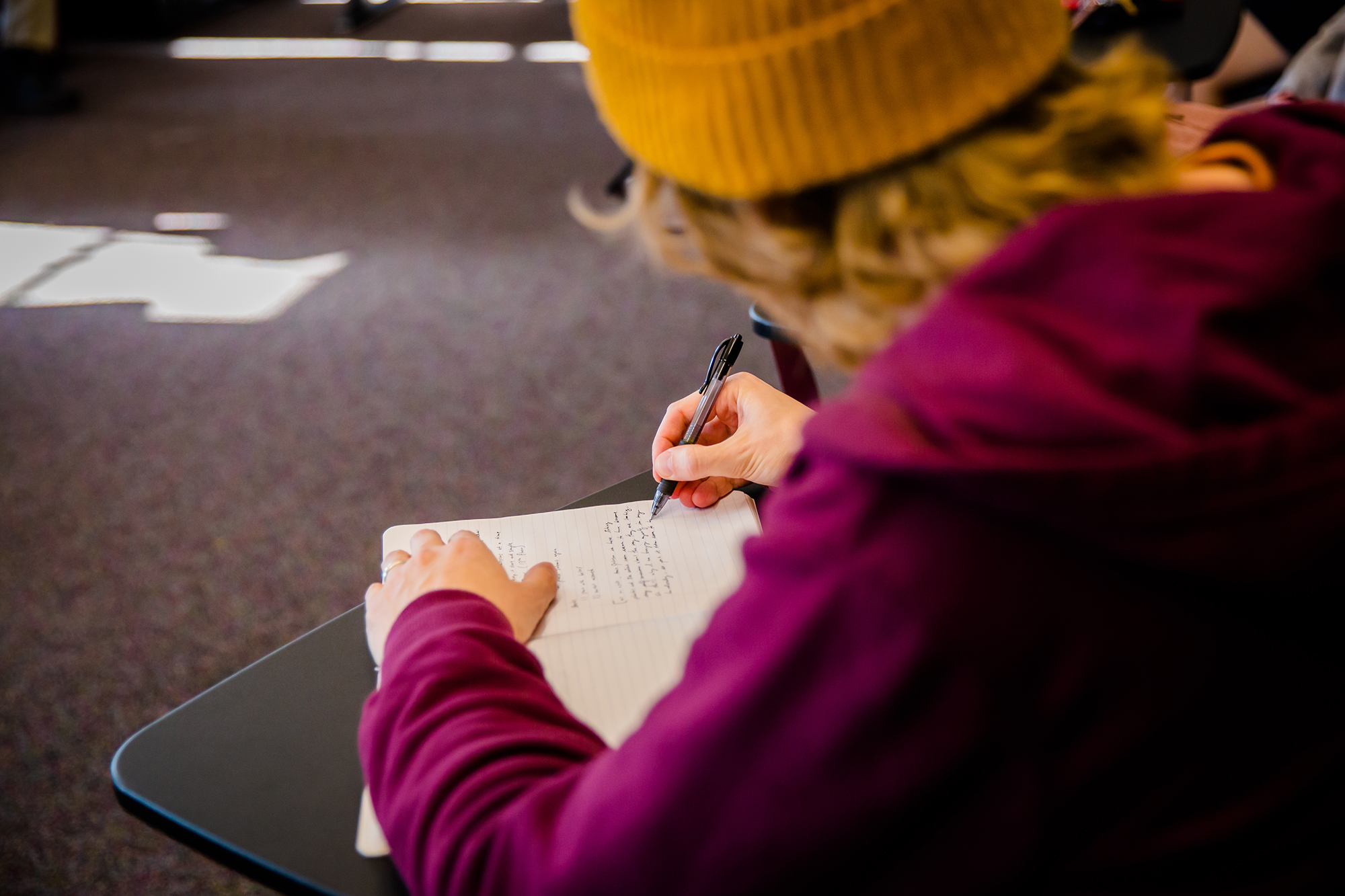 UNO English student reading and studying.